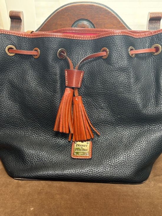 Dooney & Bourke Handbags - Dooney & Bourke Black Pebbled Leather Tote with Brown leather Trim and Tassel